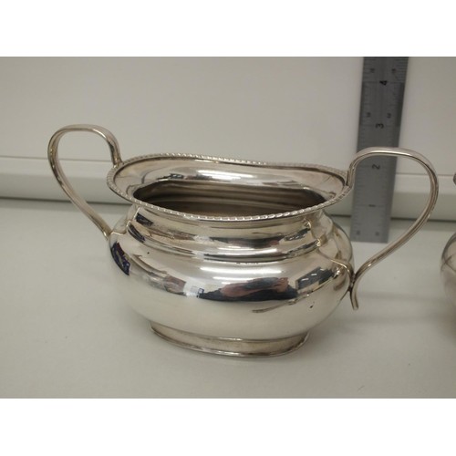 367 - MAPPIN AND WEBB SILVER PLATE CREAM JUG, SUGAR BOWL AND TWO SPOONS