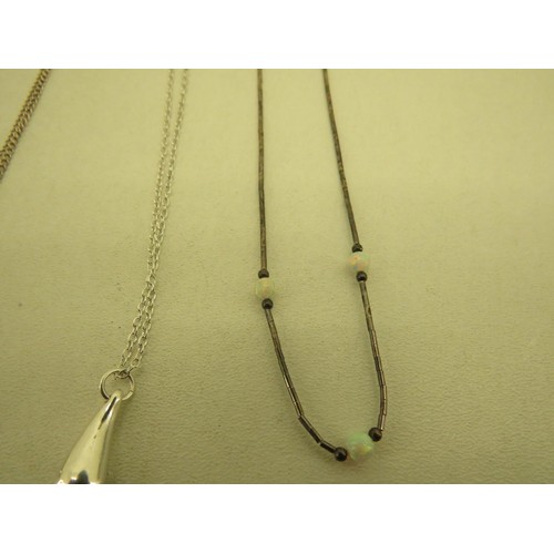 388 - STERLING SILVER CHAINS AND PENDANTS