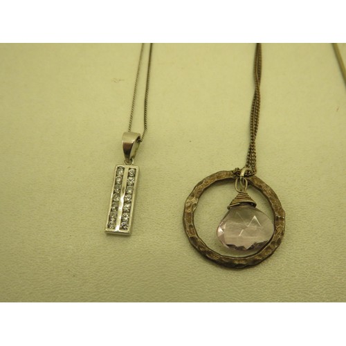 389 - 3x STERLING SILVER CHAINS AND PENDANTS