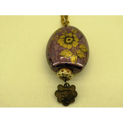 391 - VINTAGE BLUE/PURPLE CERAMIC ???? PENDANT AND NECKLACE WITH GOLD TRANFERS 1970'S APPROXIMATE LENGTH 2... 