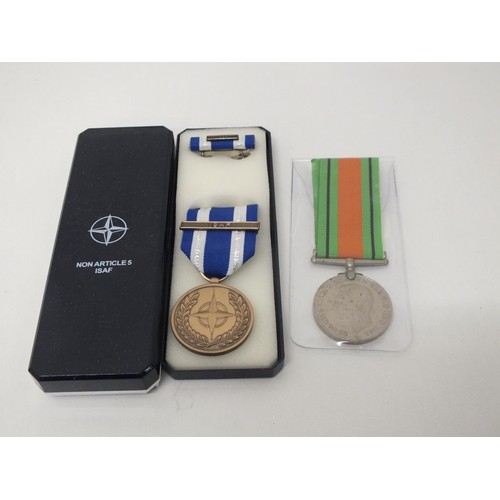 215 - 2 x MEDALS INCLUDING DEFENCE MEDAL AND ISAF