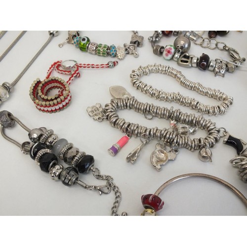 242 - 20 ASSORTED FASHION CHARM BRACELETS & NECKLACES