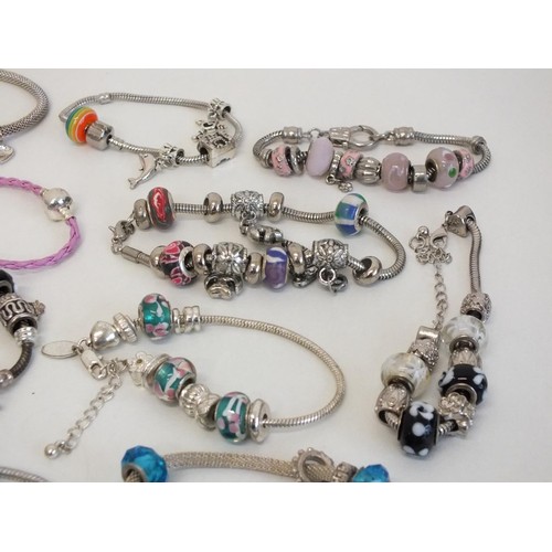 243 - 20 ASSORTED FASHION CHARM BRACELETS & NECKLACES