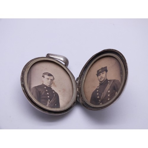 399 - VINTAGE SILVER OVAL DOUBLE PHOTO SWEETHEART LOCKET WITH MILITARY SOLDIER PHOTOGRAPHS 5CM x 3CM