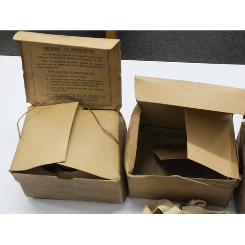 262 - FOUR VINTAGE GAS MASKS ALL BOXED