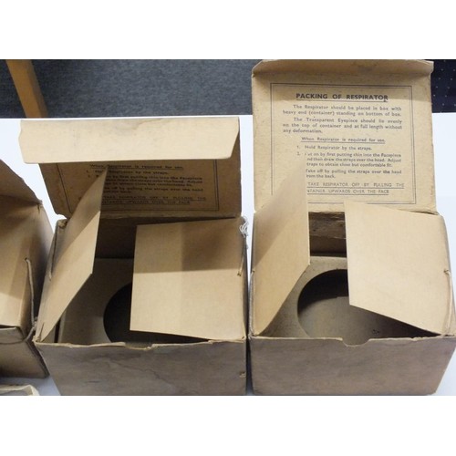 262 - FOUR VINTAGE GAS MASKS ALL BOXED