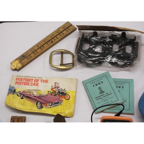 263 - BOX OF VINTAGE MISCELLANEOUS INCLUDES MILITARY BELTS, SLIDE RULERS, CAST IRON GOLFER DOORSTOP ETC