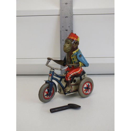 273 - RARE VINTAGE ARNOLD TIN LITHO WIND UP TOY MONKEY IN FEZ RIDING IN TRICYCLE BIKE COMPLETE WITH KEY IN... 