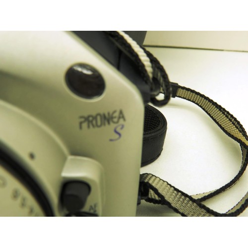 23 - NIKON CAMERA MODEL AND CASE MODEL PRONEA