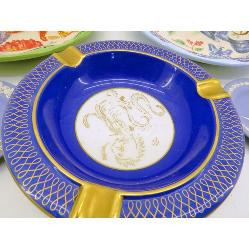 33 - TWO DECORATIVE PLATES, 11 WEDGEWOOD PLATES and A BLUE GOLD ASH TRAY