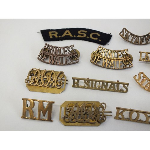 12 - BAG OF MILITARY SHOULDER TITLES