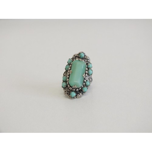 113 - WHITE METAL RING WITH GREEN STONE