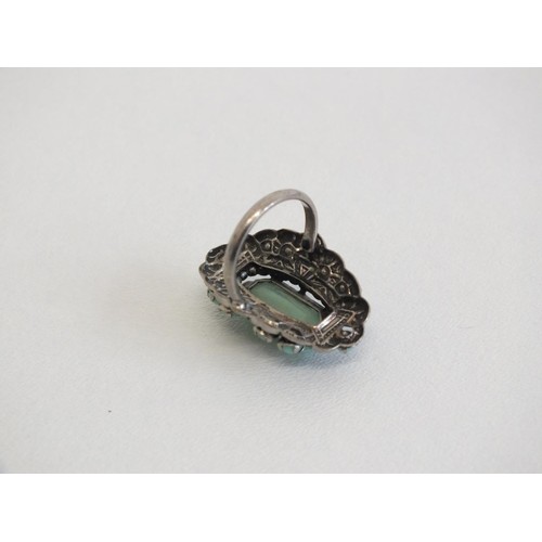 113 - WHITE METAL RING WITH GREEN STONE