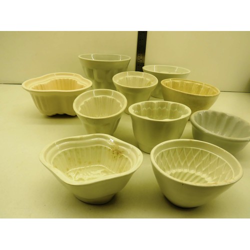 16 - COLLECTION OF TEN ASSORTED CERAMIC JELLY MOULDS