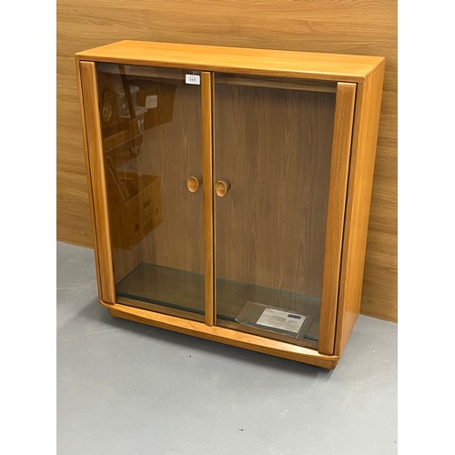 165 - ERCOL WINDSOR GLASS FRONTED DISPLAY CABINET WITH TWO GLASS SHELVES APPROX SIZE H39