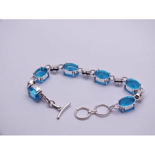 79 - 925 BLUE TOPAZ GEMSTONE BRACELET