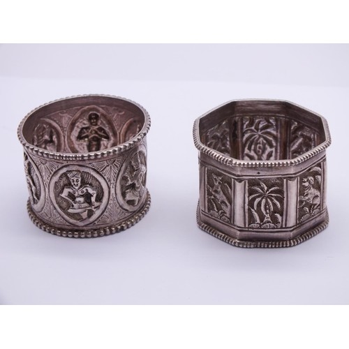 294 - TWO ORIENTAL SILVER NAPKIN RINGS TOTAL WEIGHT 47G