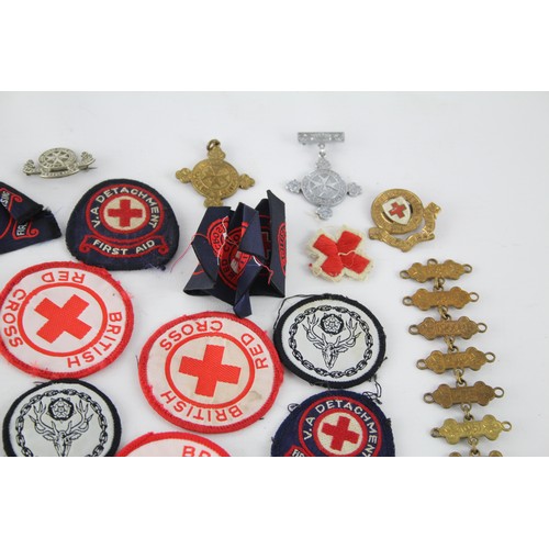 403 - Job Lot of British Red Cross, St John Ambulance Badges Inc Cloth & Metal, Etc