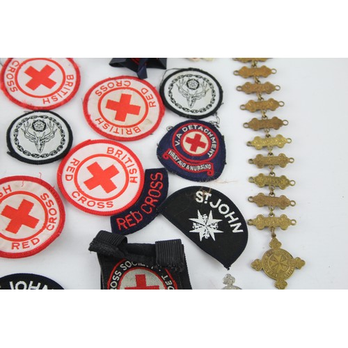 403 - Job Lot of British Red Cross, St John Ambulance Badges Inc Cloth & Metal, Etc