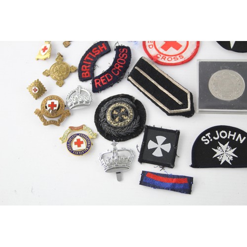 403 - Job Lot of British Red Cross, St John Ambulance Badges Inc Cloth & Metal, Etc