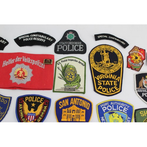 419 - Job Lot of Cloth Police & Fire Badges Inc USA, Canada, UK, Australia