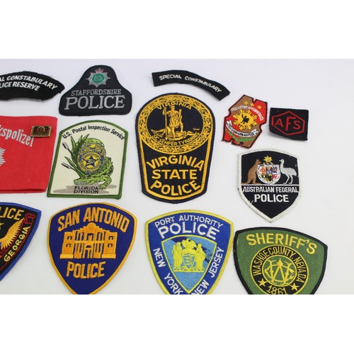 419 - Job Lot of Cloth Police & Fire Badges Inc USA, Canada, UK, Australia