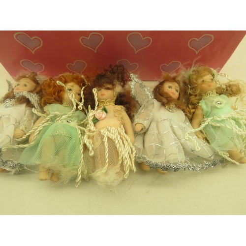 343 - BOX OF TEN MINIATURE POT DOLLS