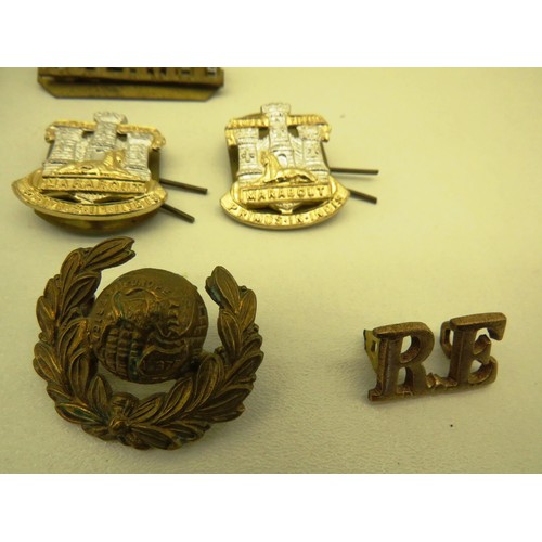 151 - BAG OF MILITARY BADGES