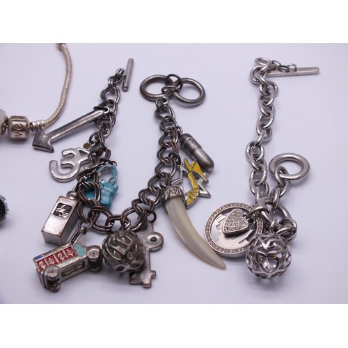 255 - SELECTION OF FASHION CHARM BRACELETS