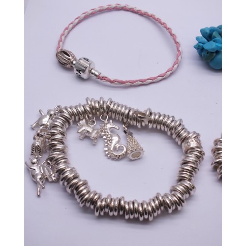 260 - SELECTION OF FASHION CHARM BRACELETS