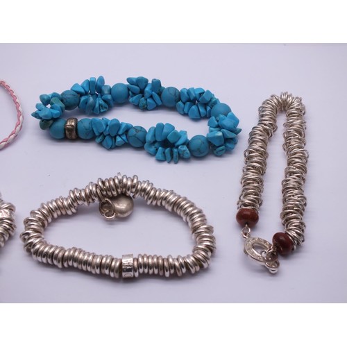 260 - SELECTION OF FASHION CHARM BRACELETS