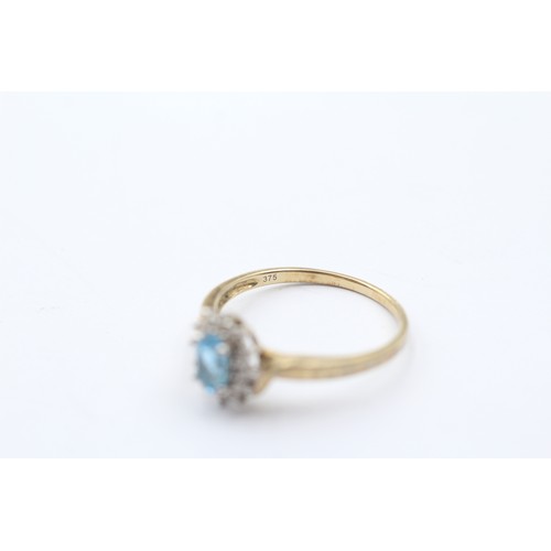 408 - 9ct gold blue topaz & diamond cluster ring (1.9g) SIZE P