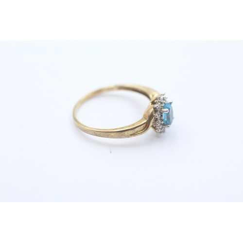 408 - 9ct gold blue topaz & diamond cluster ring (1.9g) SIZE P