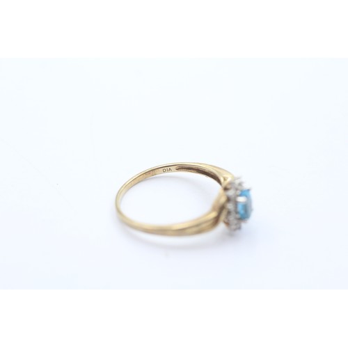 408 - 9ct gold blue topaz & diamond cluster ring (1.9g) SIZE P