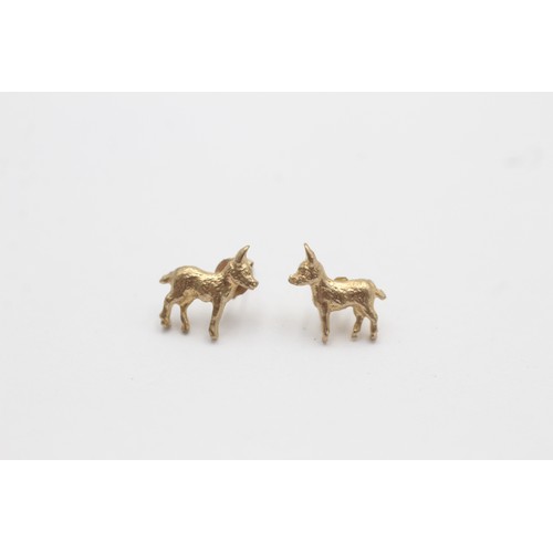 444 - 9ct gold dog stud earrings (1g)