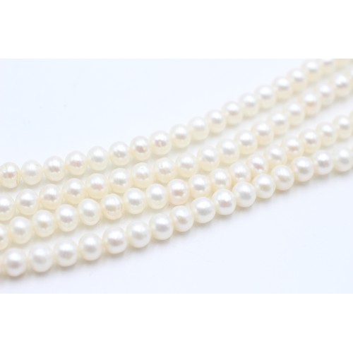 460 - 9ct gold clasp cultured pearl double strand necklace (43.6g)