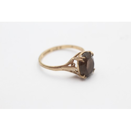 464 - 9ct gold smoky quartz single stone ring (1.9g) SIZE N