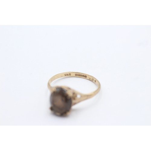 464 - 9ct gold smoky quartz single stone ring (1.9g) SIZE N