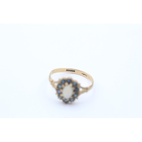 532 - 9ct gold opal & sapphire oval halo ring (1.7g) SIZE P