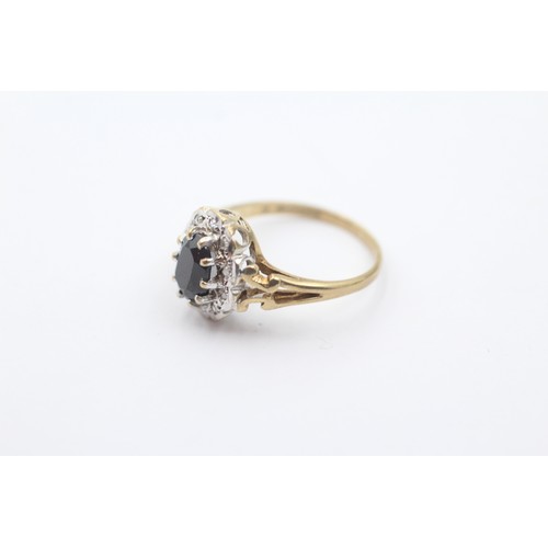 596 - 9ct gold diamond & sapphire oval halo ring (2g) SIZE J