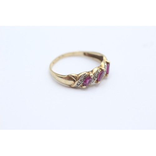 616 - 9ct gold ruby & diamond dress ring (2.2g) SIZE O