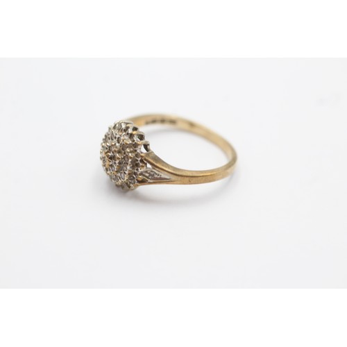 624 - 9ct gold diamond halo ring (2.1g) SIZE M