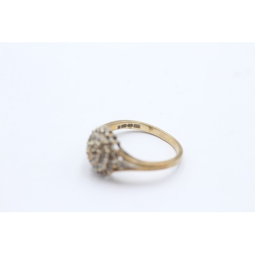 624 - 9ct gold diamond halo ring (2.1g) SIZE M