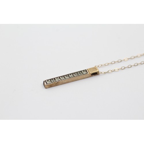 643 - 9ct gold diamond bar pendant necklace (1.6g)