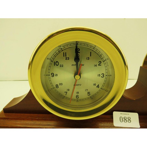 88 - BRASS CLOCK AND BAROMETER SET ON A WOODEN STAND APPROXIMATE SIZE LENGTH 53CM x HEIGHT 17.5CM