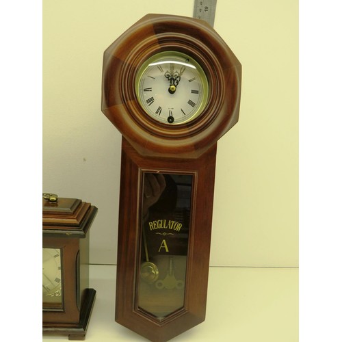 89 - TWO WOOD CASED BATTERY OPERATED MANTEL CLOCKS AND REGULATOR A CLOCK 31 DAY WITH BRASS BOBBIN AND KEY... 