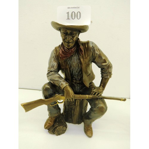 100 - BRONZE EFFECT RESIN STATUE OF JOHN WAYNE SITTING ON A LOG HEIGHT 23cm AND TWO CHUCK REN SCULPTURES F... 