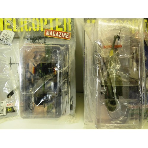 254 - BOX OF HELICOPTERS WITH MAGS