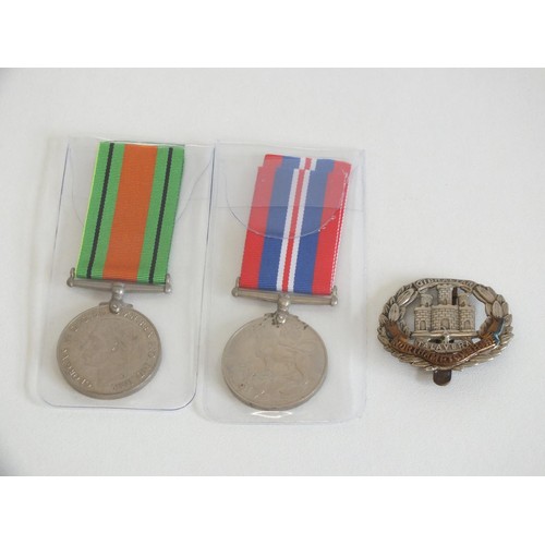 14 - WWII MEDALS AND NORTHAMPTONSHIRE CAP BADGE