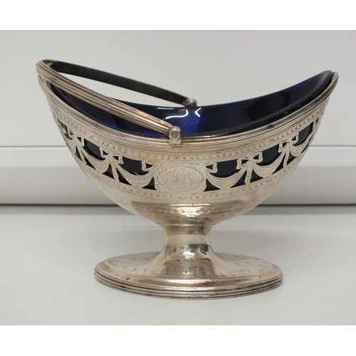 35 - c1787 GEORGE III STERLING SILVER PIERCED DECORATED OVAL SUGAR BASKET WITH HANDLE AND SWEPT PEDESTAL ... 